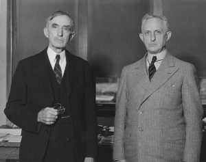 An unsmiling Mumford with an equally unsmiling Secretary of Agriculture at Mumford's retirement celebration. Courtesy University of Missouri Archives.