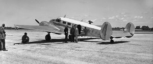 Mizzou’s second airplane was a navigational trainer rebuilt to corporate configuration. AF-645 is seen here boarding passengers on the ramp of Columbia Municipal Airport, now Cosmo Park. Courtesy University Archives.