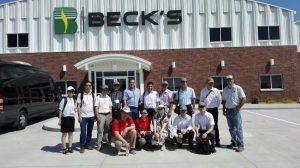 Teng Lim, front row, first from left, and a group of international visitors toured a local seeds company during their visit. Photo courtesy Teng Lim.
