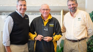 In November, Everett Forkner will join the giants of the livestock industry as the 2020 inductee to the Saddle & Sirloin portrait gallery. Forker (middle) is pictured here with CAFNR Vice Chancellor and Dean Christopher Daubert (left) and Division of Animal Sciences Director Bill Lamberson.