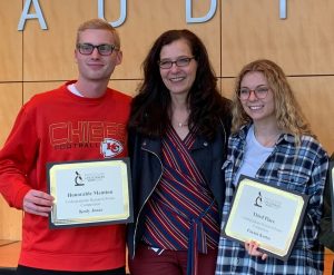 Kody Jones, left, with Dr. Antje Heese, middle, and Paxton Kostos, right. Both students conduct research in Dr. Heese's lab. Jones said he couldn't believe two students from Dr. Heese's lab were among the 15 recipients who received this award. 