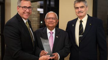Kamal Yadav, middle, pictured during the 2019 College of Agriculture, Food and Natural Resources (CAFNR) Column Award for Distinguished Alumni award night. Yadav is pictured with CAFNR Vice Chancellor and Dean Christopher Daubert (left) and Michael Chapman, chair of the Department of Biochemistry.