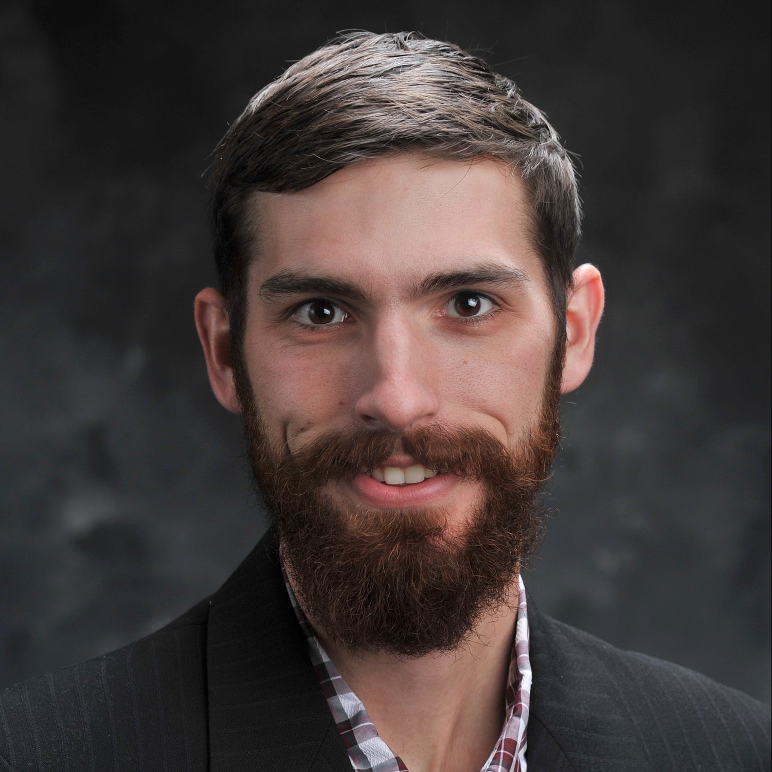 Portrait photo of Justin Calhoun, Ph.D.