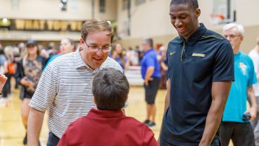 Jalani Williams has been receiving hands-on learning experiences during his internship with Special Olympics Missouri this summer. Williams, pictured with head football coach Eliah Drinkwitz, spoke with numerous athletes during the opening ceremonies of the Special Olympics Missouri State Summer Games in late May.