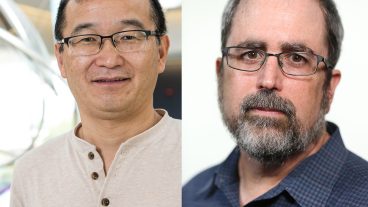 Left is an Asian man with black-rimmed glasses and a beige shirt. Right is a white man with dark grey glasses, a beard and a dark blue button-up shirt