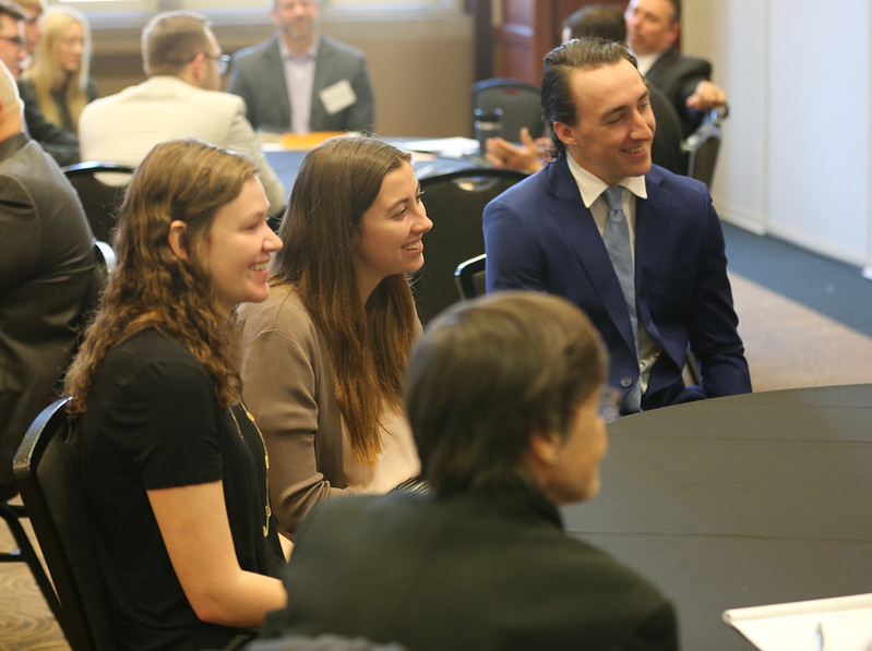 Students smiling at personal financial planning event