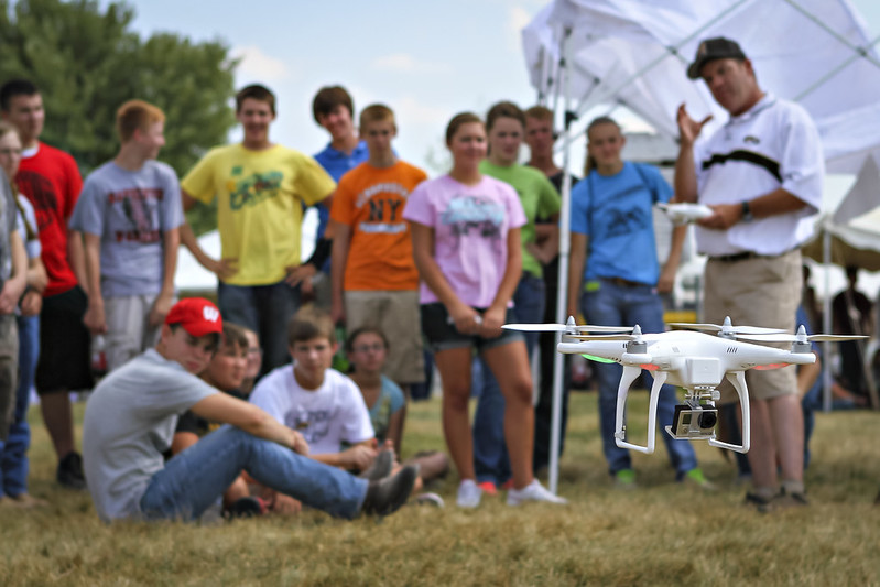 Students watching a drone demonstration