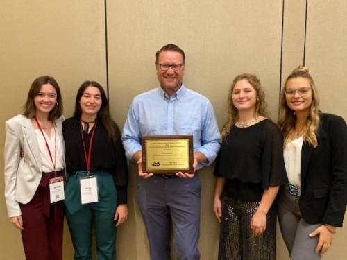 The MU Animal Sciences Quadrathlon team took home the gold at the ASAS National Meeting for the second year in a row. From left to right: Aliyah Luntsford, Catriona Chew, Dr. Bryon Wiegand, Caleigh Grote, Alexia Sweiger. Photo courtesy of Dr. Bryon Wiegand.
