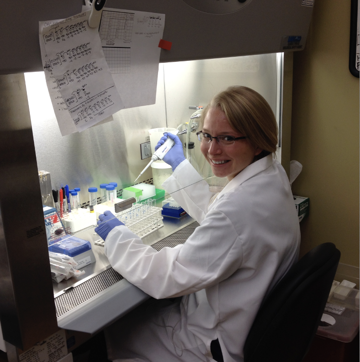 A woman works in a lab.