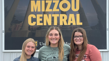 Students in front of Mizzou Central sign