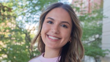 A student poses for a portrait.