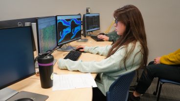 A student works in a computer lab.