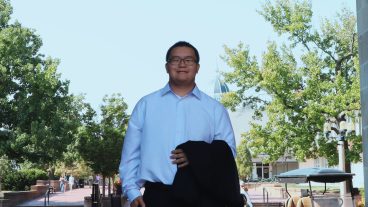 A student poses for a portrait.