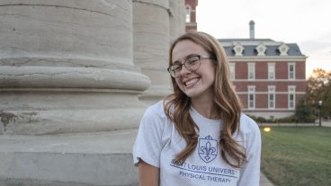 A student poses for a portrait.