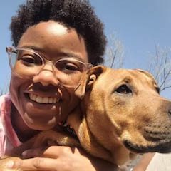 A student with a dog. 