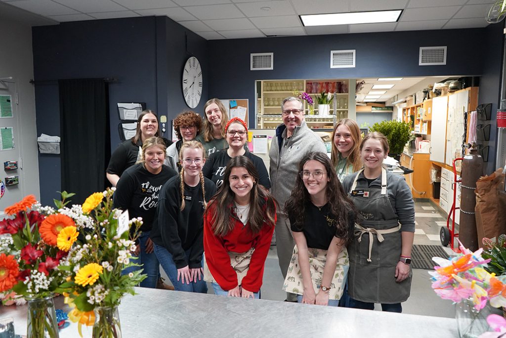 Tiger Garden student workers pose with Dean Daubert.