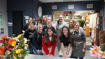 Tiger Garden student workers pose with Dean Daubert.