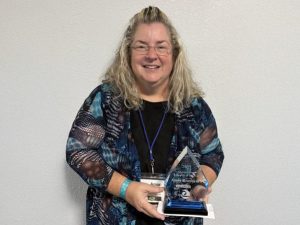 Amie Breshears smiling.