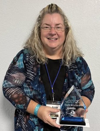 Amie Breshears smiling.