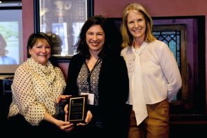 Sonja receiving a plaque.