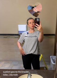 McKenna Kramer in a Boone Health t-shirt posing for picture.