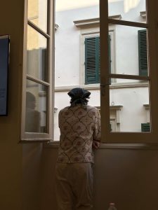 Ben Laizerovich looking out window.