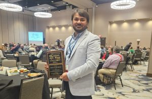 Rasel Parvej smiling.