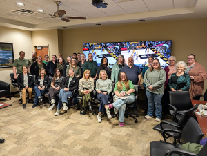 Staff gathered for event.