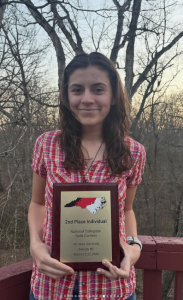 India Williams holds second place individual plaque.