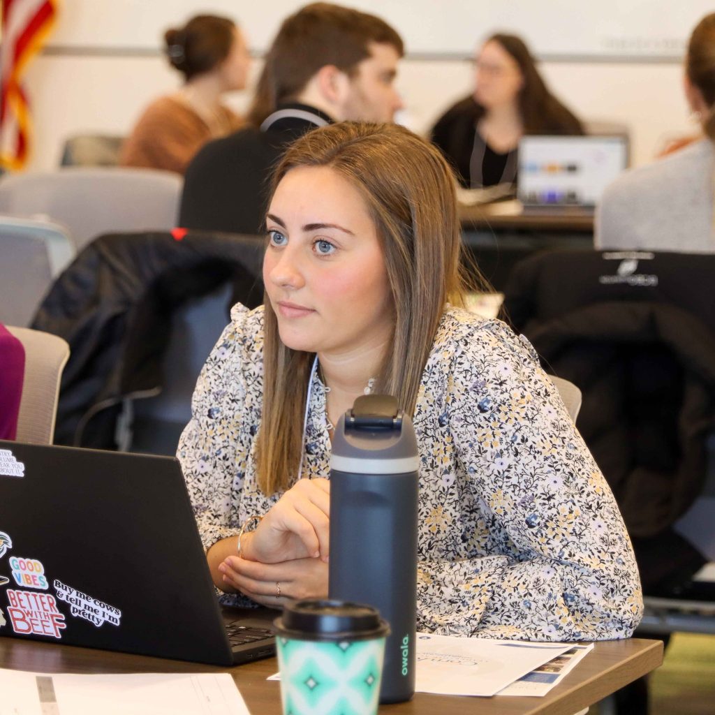 Student with computer.