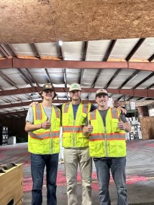 Brennan Greenwell (left) with two coworkers at GreenpointAg during his 2023 summer internship.