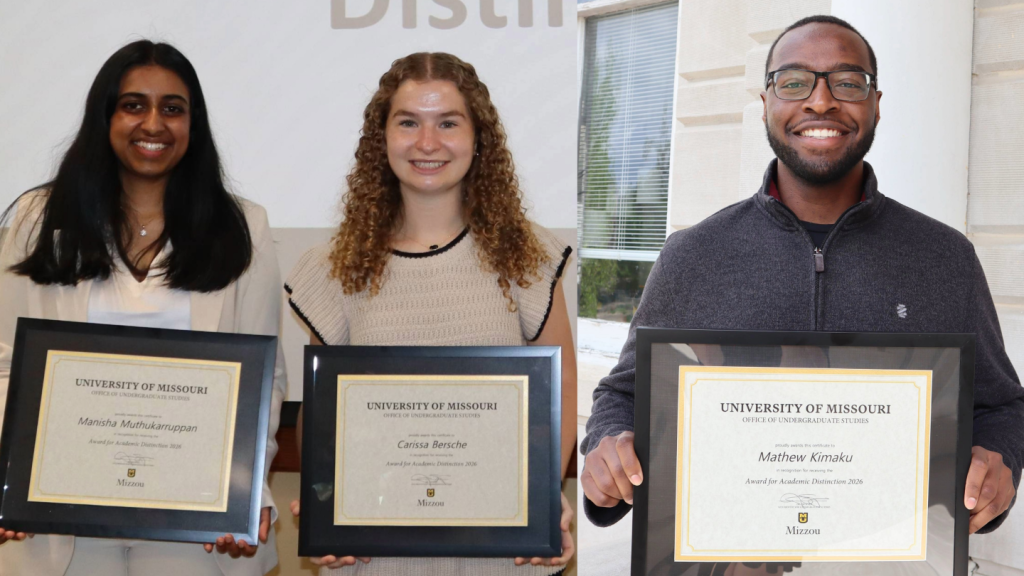 Manisha Muthukarruppan, Carissa Bersche and Mathew Kimaku smile and hold their Awards for Academic Distinction.