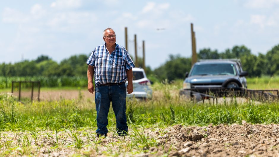 A man standing in a field.