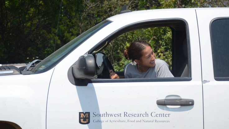 Chloe Stenger drives a pickup truck at Mizzou's SW-REEC.