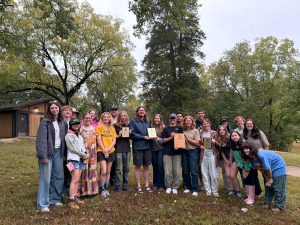 Mizzou's soil judging team members stand together and smile while holding their awards.