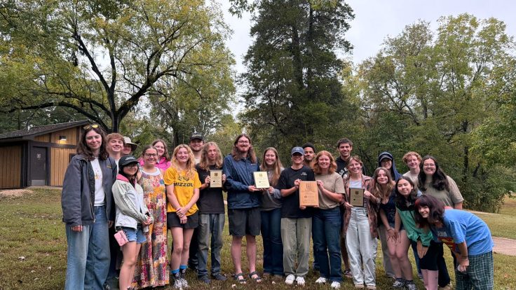 Mizzou's soil judging team members stand together and smile while holding their awards.