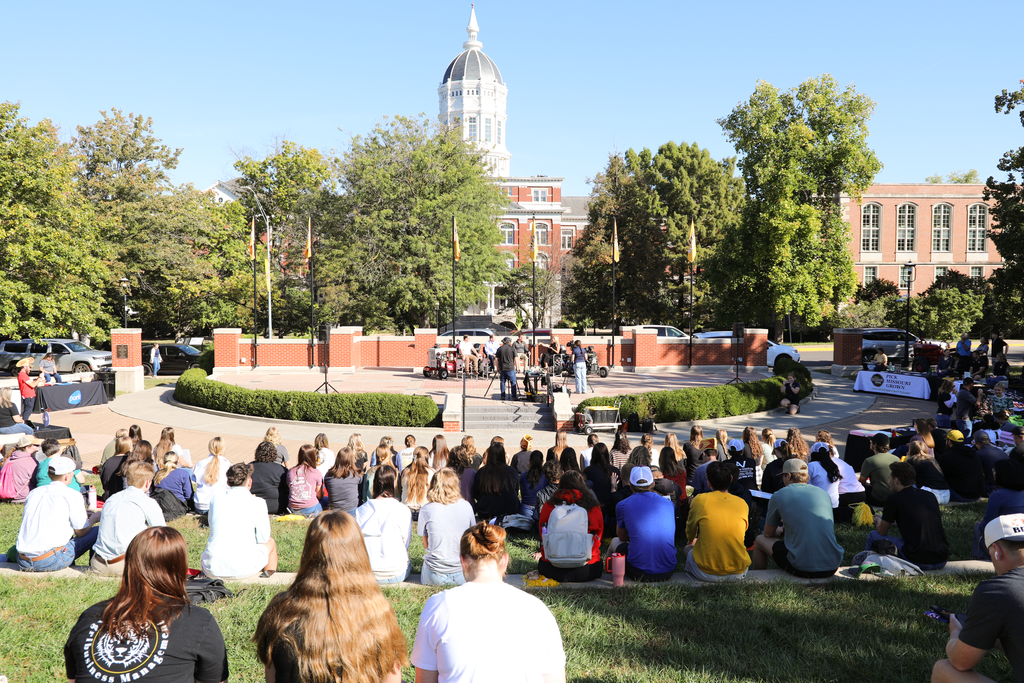 People watching live taping of the U.S. Farm Report at Traditions Plaza.