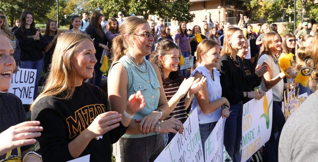 A crowd of CAFNR students cheering on Carnahan Quad.