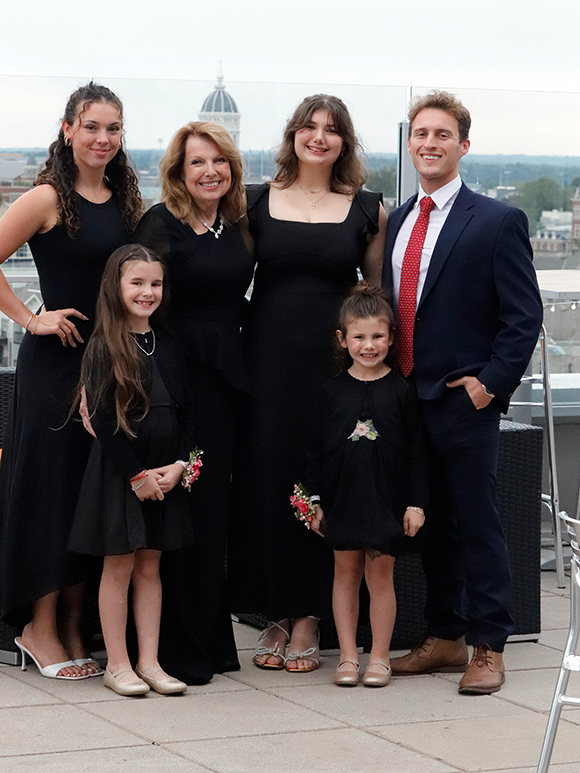 Linda Geist with her grandkids at the Roof.
